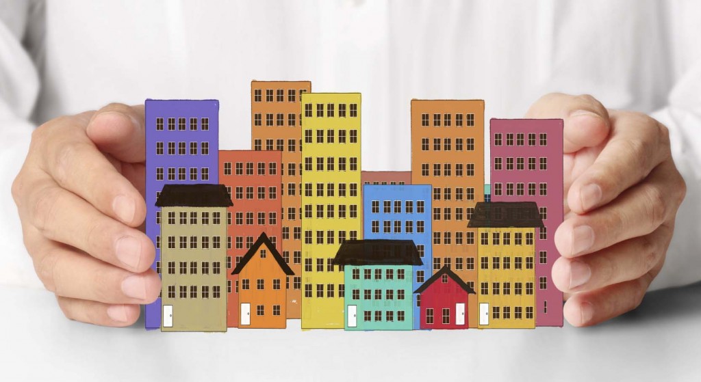 holding house representing home ownership