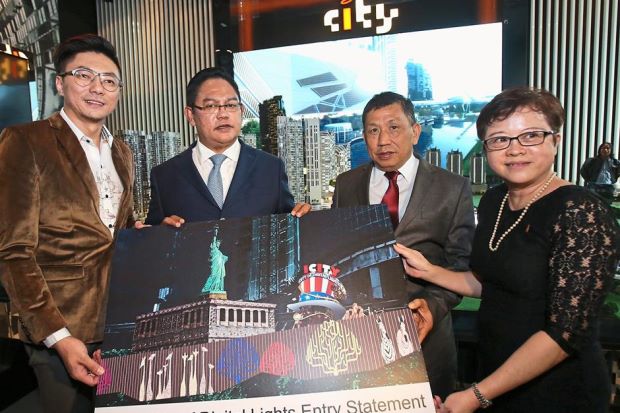 Chester Properties group chief executive officer Datuk Howard Chew (left) holding an artist’s impression of the entry statement to be revealed in December 2016. This will be the face of i-SoHo and i-Suite that Chester Properties has fully taken up.