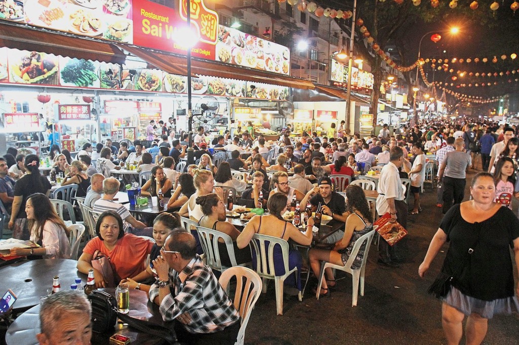 Crowds enjoying the food offered along Jalan Alor. FAIHAN GHANI/The Star